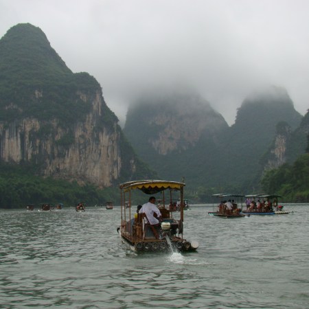Cruising down the Li River on a powered bamboo raft