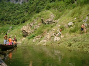 towing the boat upstream by rope