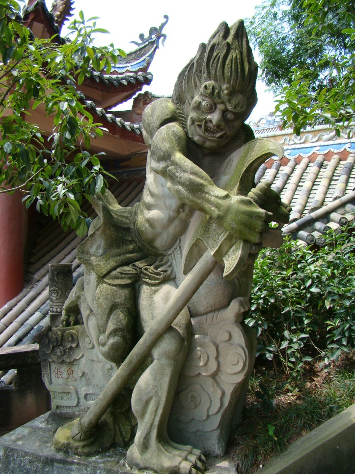 Sculptures depicting ferocious demons along the Torturing Pass