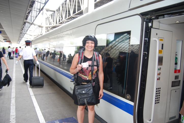 Boarding our speed train from Chongqing to Chengdu
