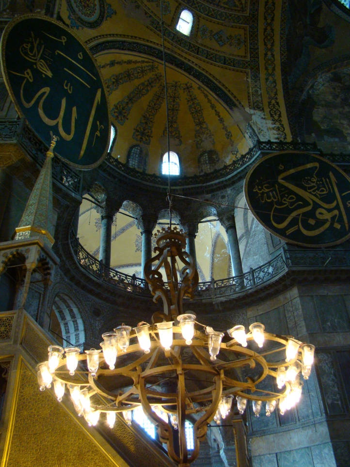 Interior view of the Hagia Sophia, showing Islamic elements on the top of the main dome.