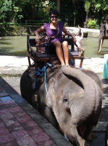 Riding an elephant in Bali