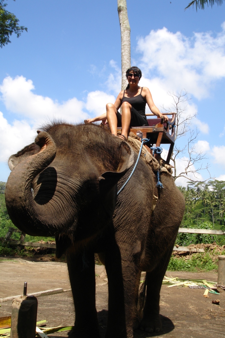 Riding an elephant in Bali