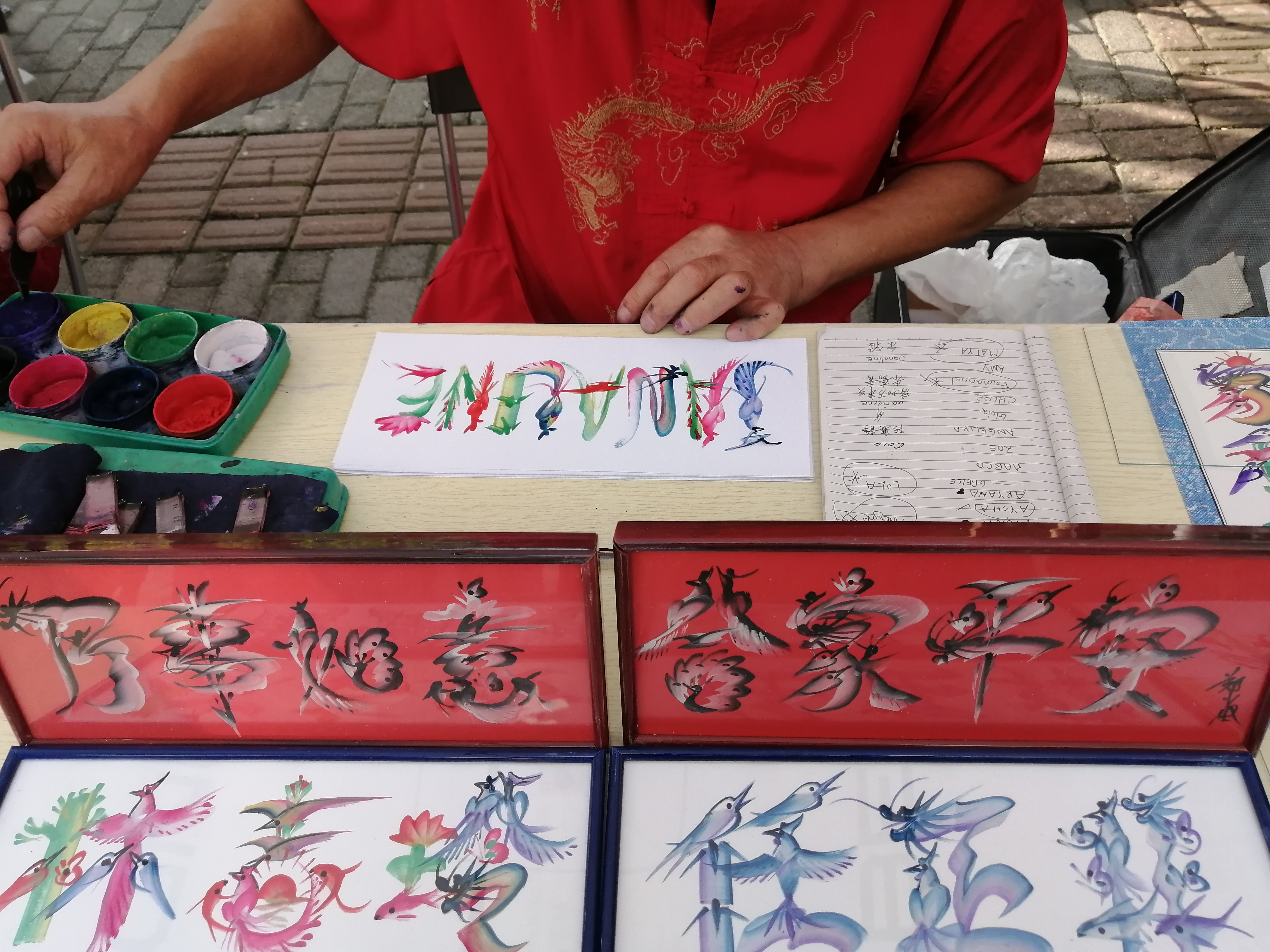 Chinese Calligraphy artist at work