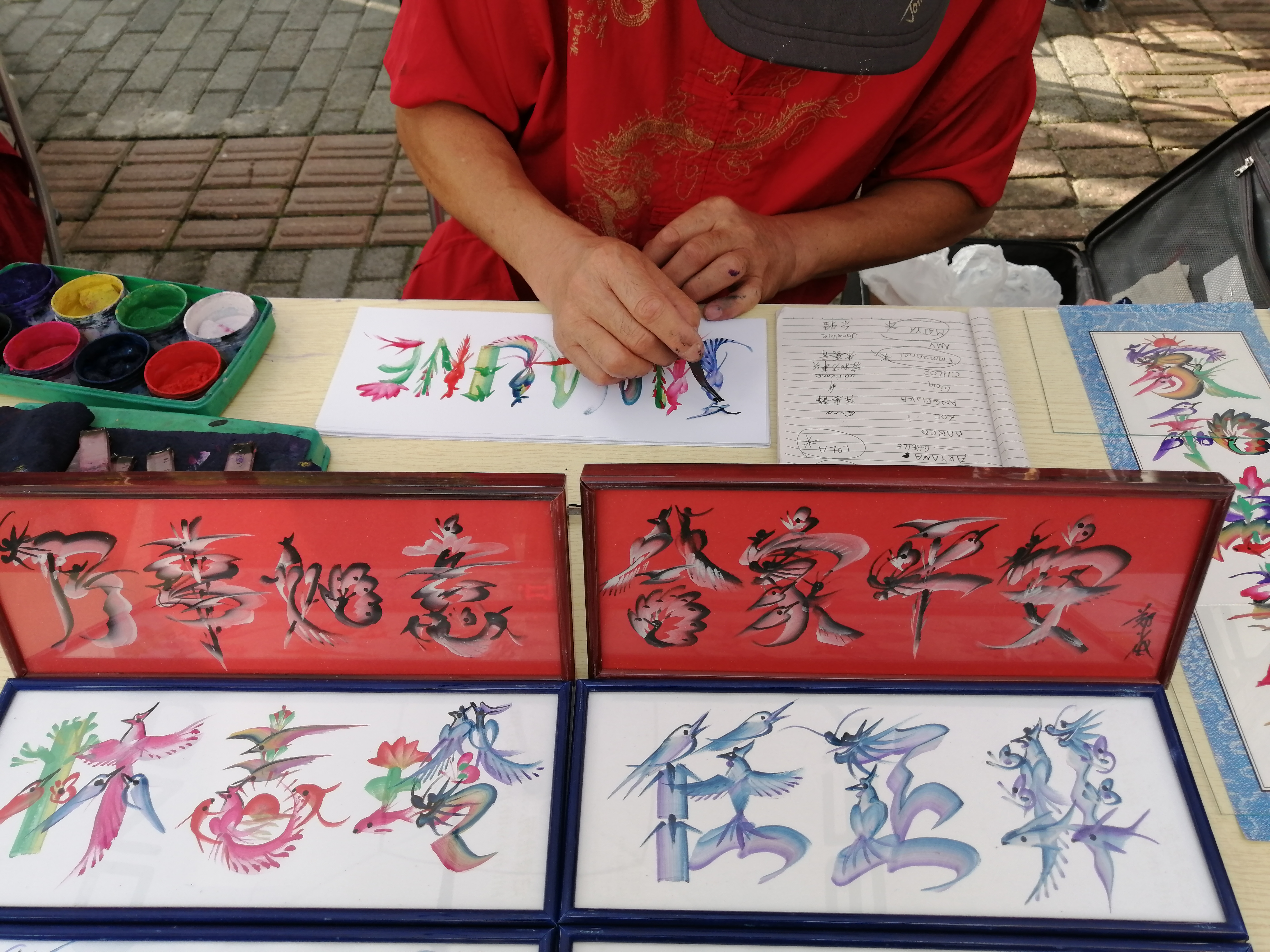 Chinese Calligraphy artist at work
